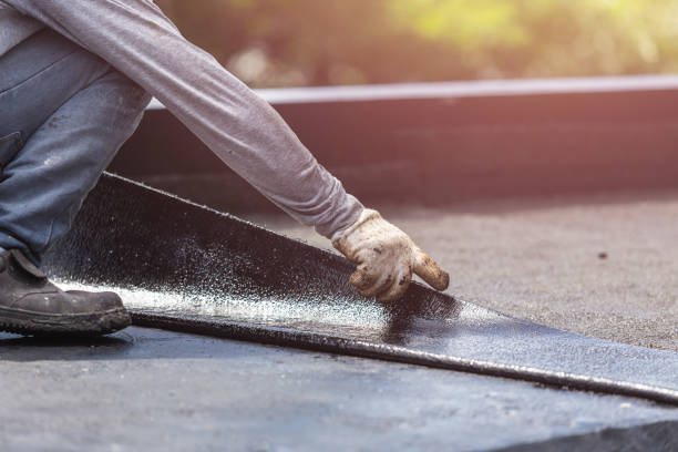 Professional Exterior Waterproofing technician working in New Boston, MI